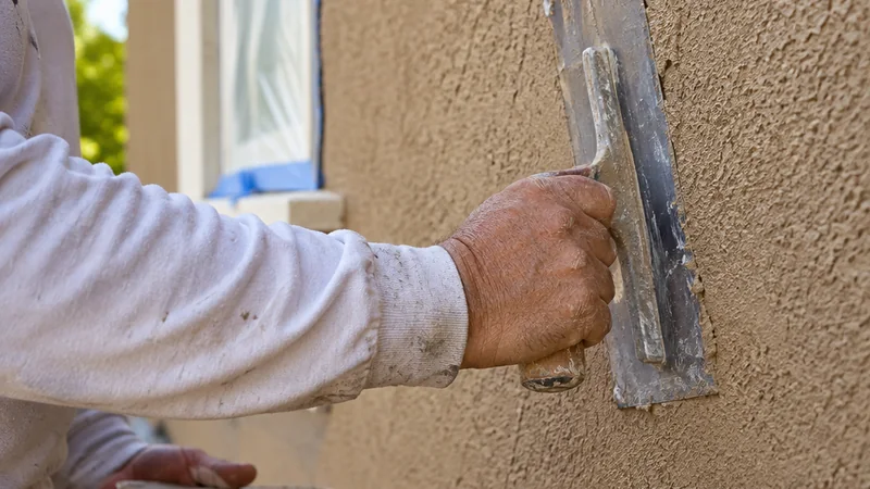 Troweling an integrally colored acrylic stucco finish